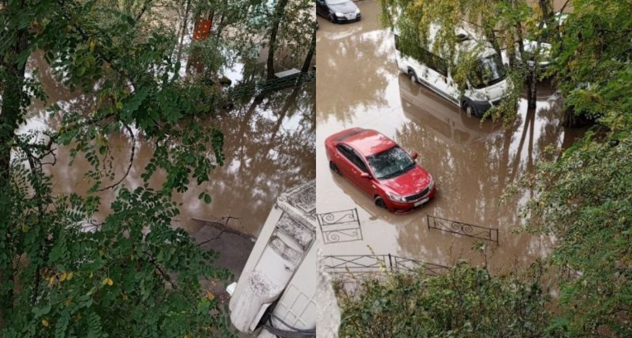 Фекальное море скрыло колесо микроавтобуса во дворе на Лизюкова после очередного дождя